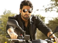 Abhishek Bachchan as the police inspector in Dum Maaro Dum